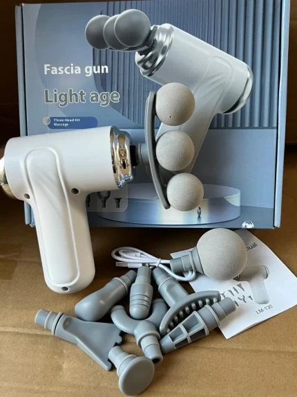 LM-130 massage gun with three massage heads